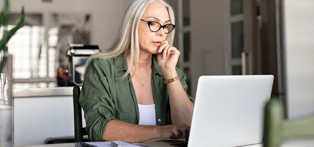 Middle Age Woman at Computer