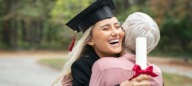Happy Graduate Hugging Mom