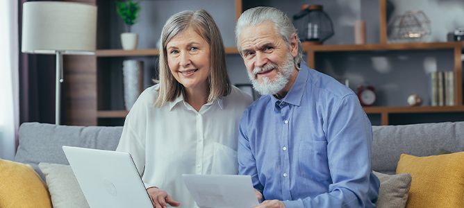 Senior couple reviewing documents