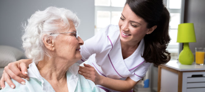 Nurse With Senior Woman