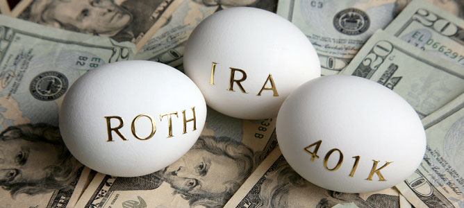 IRA, 401K, Roth Eggs laying on cash