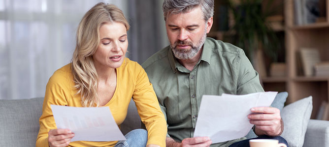 Couple Reviewing Documents