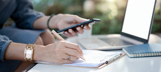 Woman Taking Notes