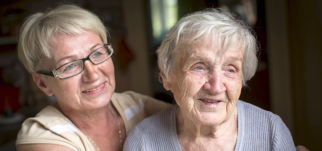 Adult daughter with elderly mother